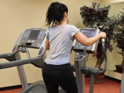 Girl exercising on treadmill