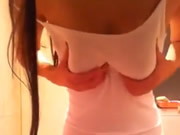 Asian Babe Shows Her Tits And Pussy